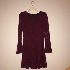 A long sleeve, short dress